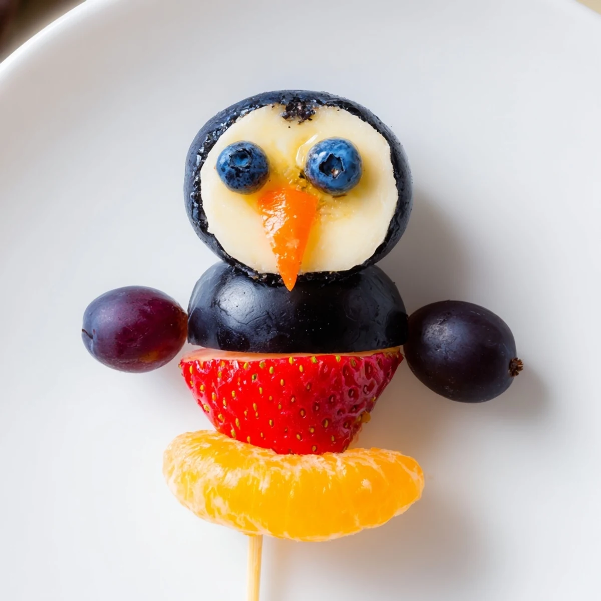 These fun Penguin Fruit Skewers offer a healthy and delicious, eye-catching snack presentation.