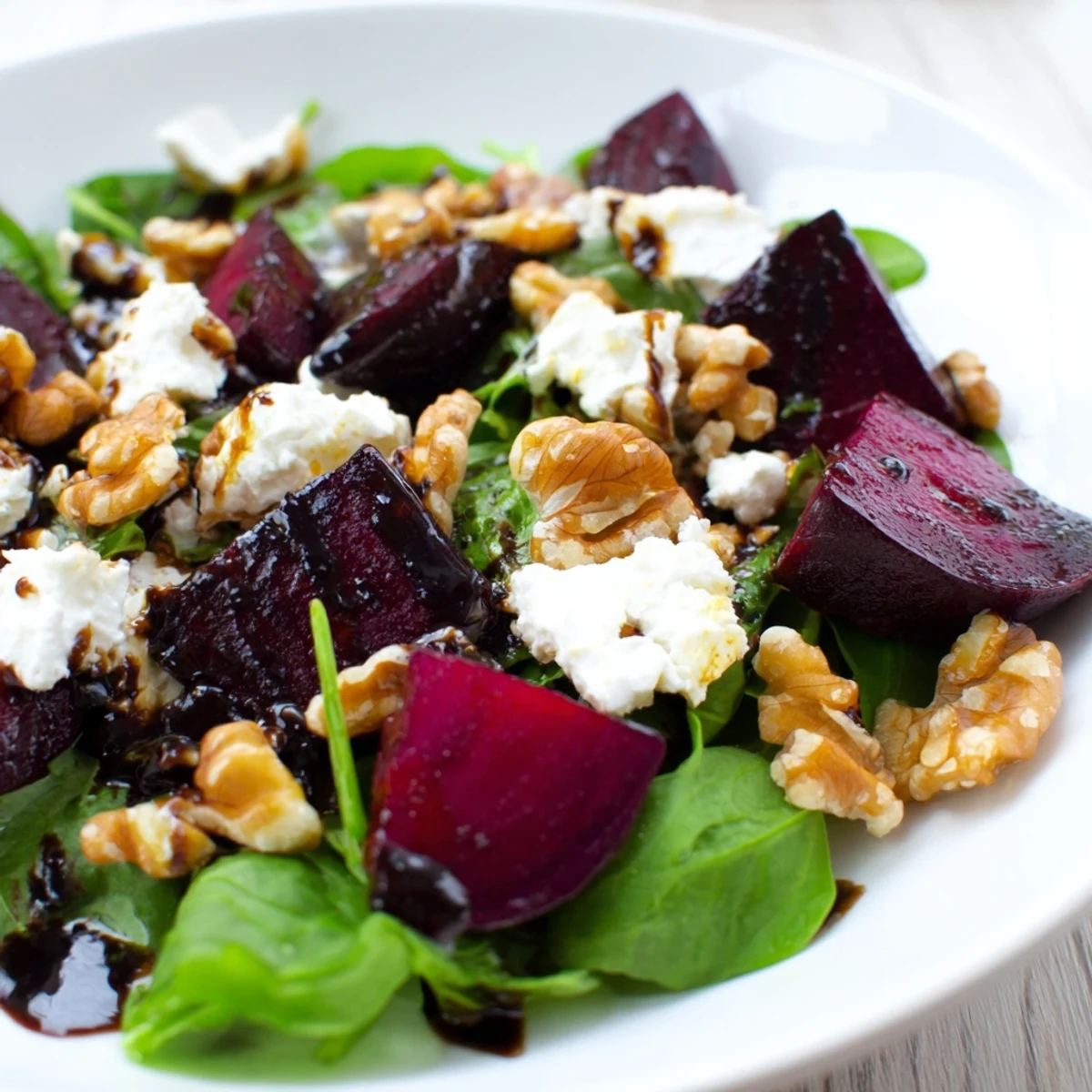 Vibrant Beet and Goat Cheese Salad, showing colorful roasted beets with creamy goat cheese.