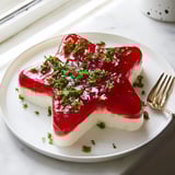 Tangy Cream Cheese and Pepper Jelly Star, a delightful appetizer, is beautifully shaped and so delicious.