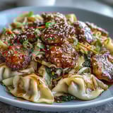 Quick Creamy Potsticker Noodle Stir-Fry with ground turkey and ramen noodles tossed in a rich peanut soy sauce.