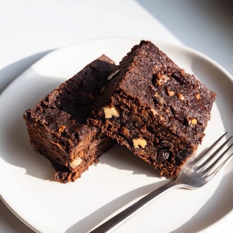 Decadent brownies made with nut-milk pulp, perfect for chocolate lovers.  