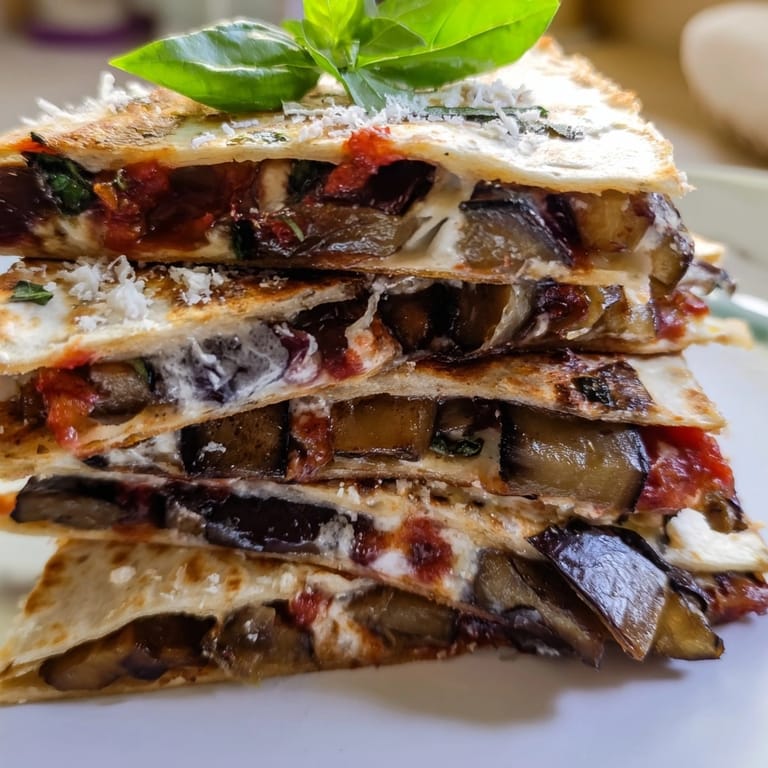 Savory Cheesy Eggplant Parmesan Quesadillas: Imagine eggplant, cheese, and marinara pressed in a tortilla.