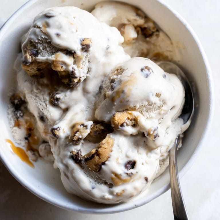 Homemade Cottage Cheese Ice Cream featuring sweet chocolate chip cookie dough swirls.