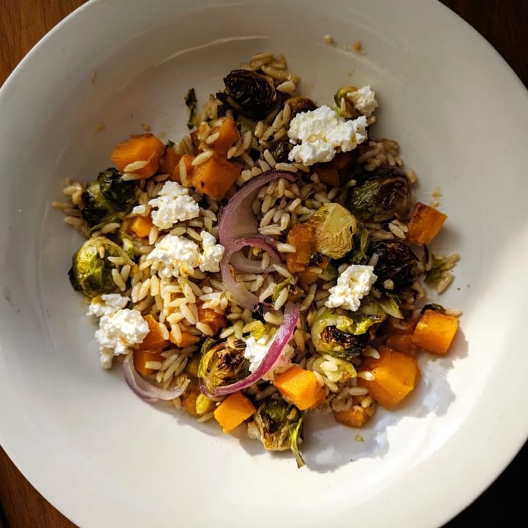 Vibrant and colorful, this Best Fall Harvest Orzo Salad offers a delicious taste of autumn flavors.